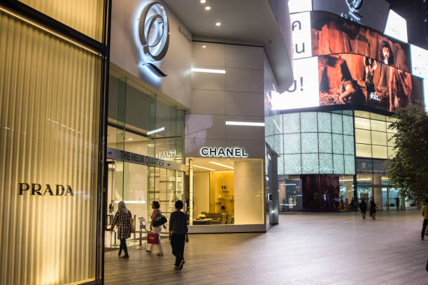 Bangkok, Thailand - September 22, 2016: Pedestrians walking outside Luxury shops at night in Bangkok, Thailand.