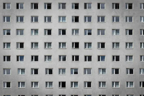 many windows on building facade - apartment block