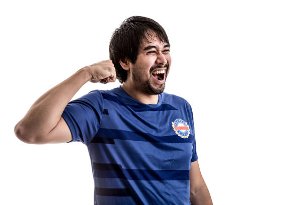 istock Sport Player on blue uniform celebrating on white background 646182430