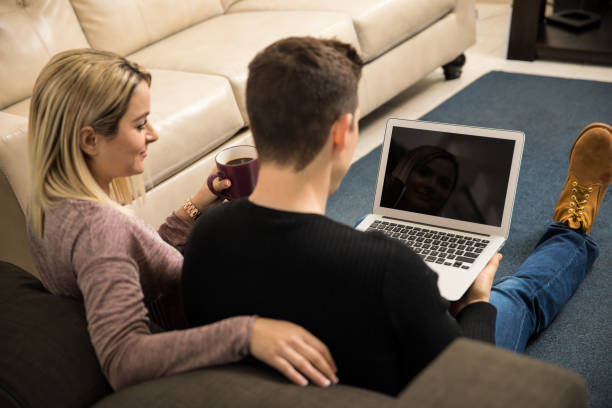 istock Couple watching TV shows on a laptop 646189578