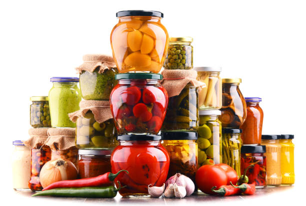 istock Jars with variety of pickled vegetables  isolated on white 646201130