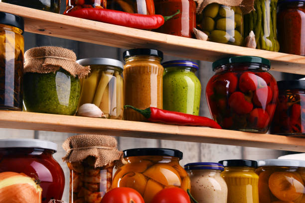istock Jars with variety of pickled vegetables. 646201274