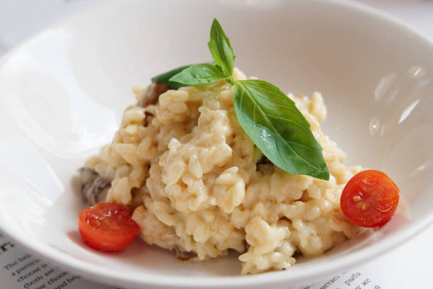 Plate of seafood risotto served with shrimps