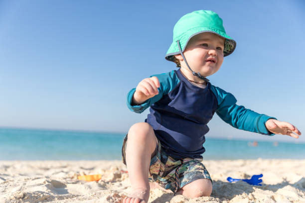 istock Baby Boy Crawling on Tropical Beach, Cayo Coco, Cuba 646217728