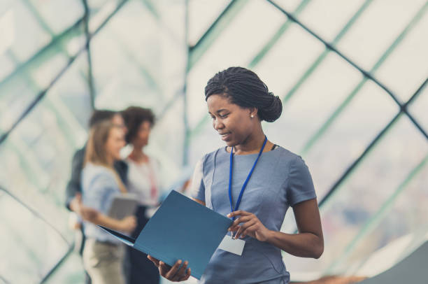istock Businesswoman attending a conference 646217914
