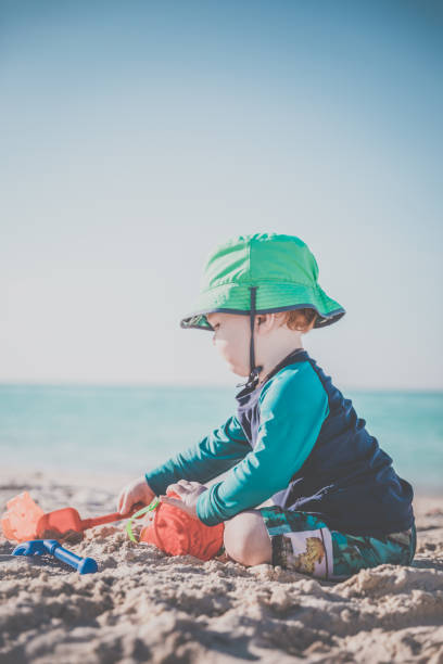 istock Baby Boy Playing on Tropical Beach, Cayo Coco, Cuba 646218058