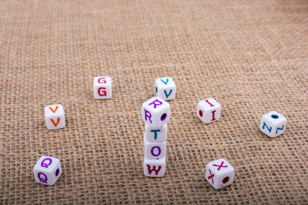 istock Colorful alphabet letter cubes on a canvas 646218102