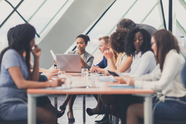 istock Business people attending a meeting 646218122