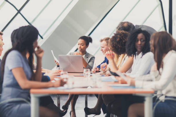 istock Business people attending a meeting 646218176