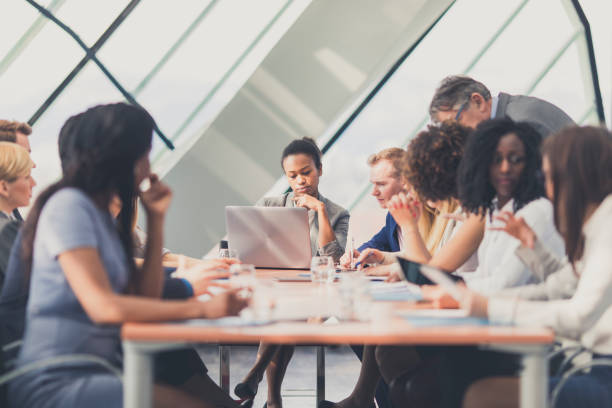 istock Business people attending a meeting 646218220