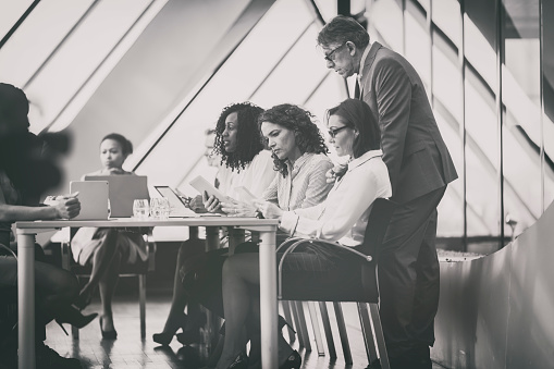 Business people attending a meeting in the office