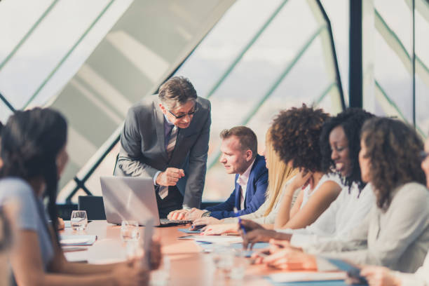 istock Senior businessman having a business presentation 646221488