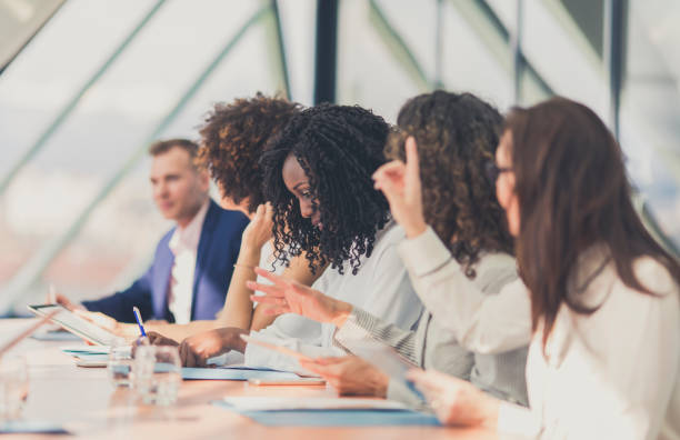 istock Business people attending a meeting 646221746