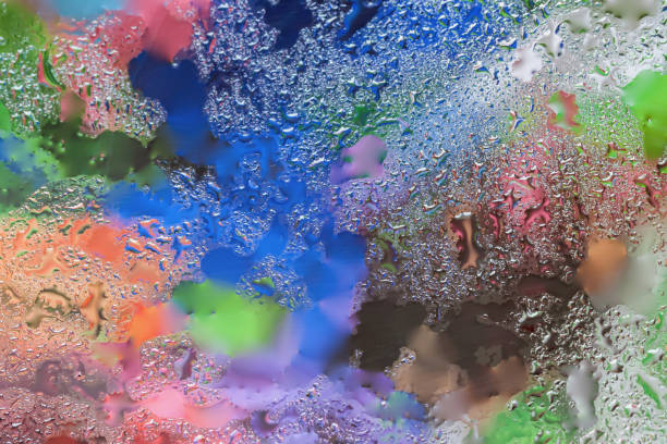 istock Abstract in bright colors design element with real light reflection for banner, print, template, web, decoration. Modern background in halftones with raindrops 646224502