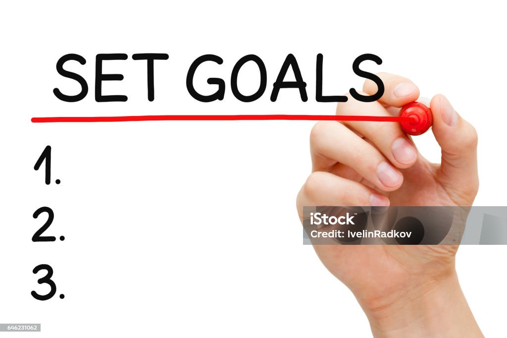 Set Goals List Concept Hand writing Goals setting list with marker on transparent wipe board. Goal - Sports Equipment Stock Photo