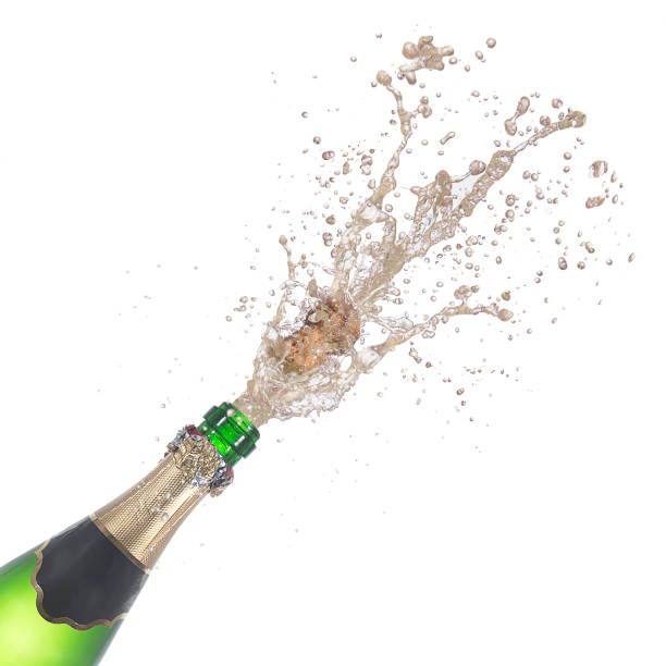istock bottle of champagne popping its cork 646235310