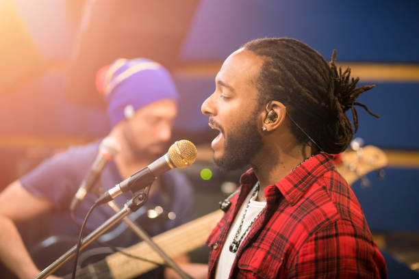 istock Music band rehearsing in studio 646239862