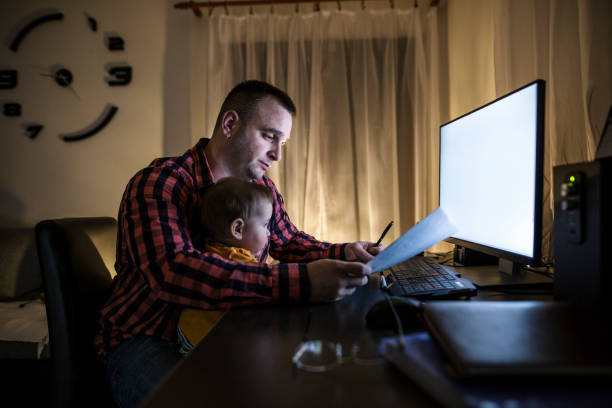 istock Baby boy's and dad's sleepless nights 646242484