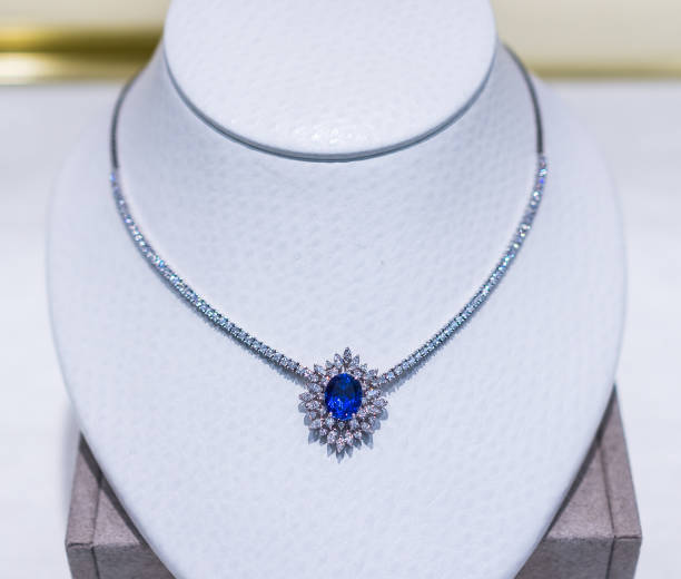 istock Blue diamond sapphire necklace on mannequin 646242762