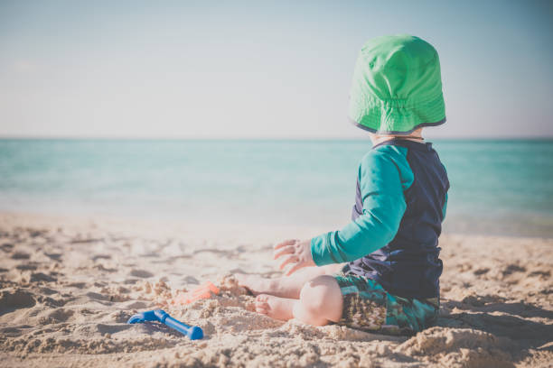 istock Baby Boy Playing on Tropical Beach, Cayo Coco, Cuba 646246292