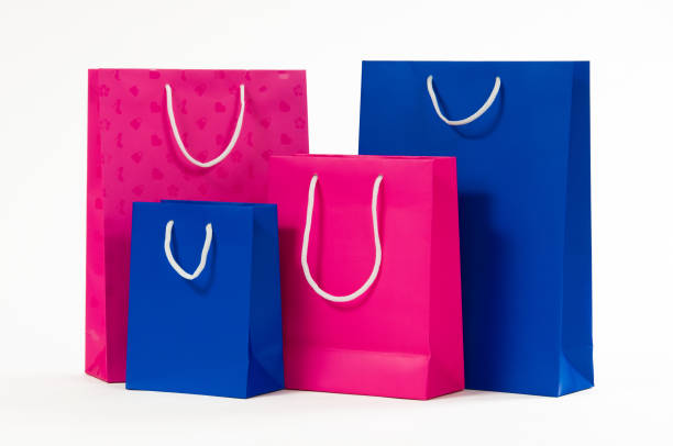 istock Pink and blue paper bag isolated on white background. 646246608
