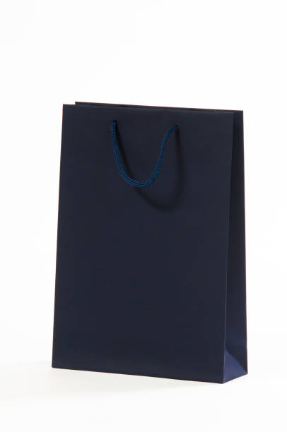 istock Dark blue, black paper bag on a white background 646246628
