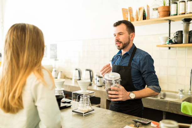 istock Barista talking about coffee grains 646248452