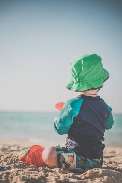 istock Baby Boy Playing on Tropical Beach, Cayo Coco, Cuba 646254874