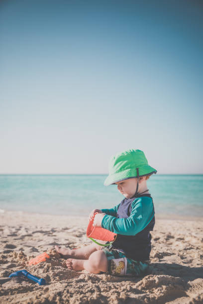 istock Baby Boy Playing on Tropical Beach, Cayo Coco, Cuba 646260796