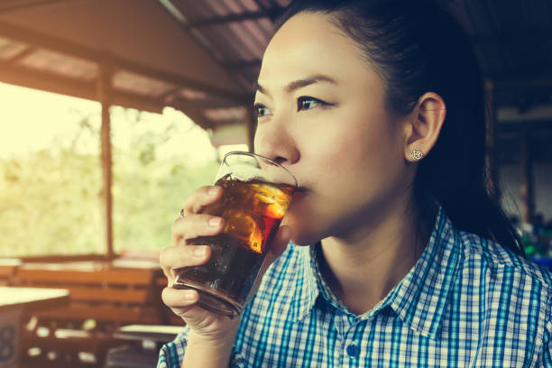 istock Asian women drink soft drink soft drink 646264690