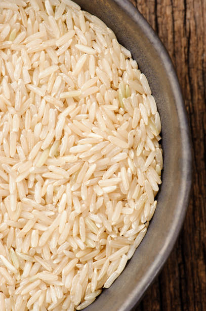 istock pile of brown rice 646280438