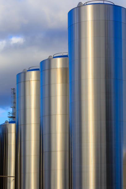 istock Stainless steel tanks for holding milk. 646285228