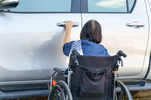 istock Elderly woman open door car 646286554