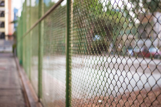 istock metal or Wire fence. 646304108