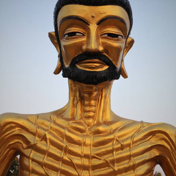 istock Bearded Gold Buddha Statue Head and Chest 646309102