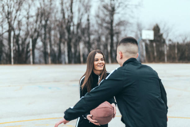 istock Couple playing basketball 646319832