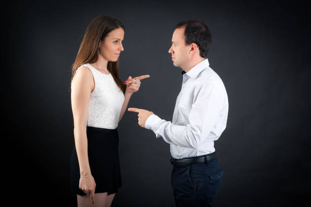 businessman and businesswoman. partnership of businesspeople. boss and employee. sexy colleague experts. man and woman in glasses. business partners on black background. formal couple in love.