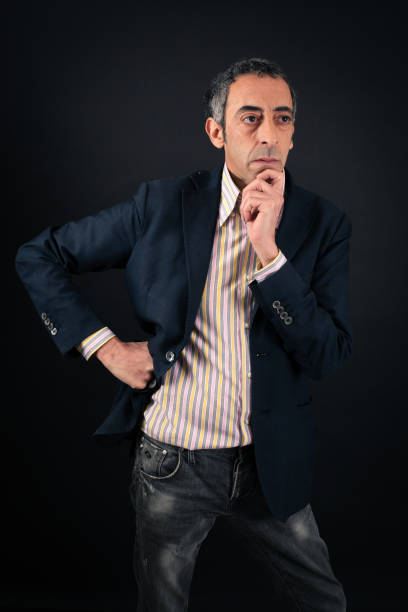 istock Handsome man doing different expressions in different sets of clothes: thinking 646325834