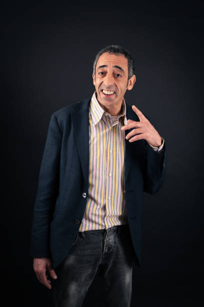 istock Handsome man doing different expressions in different sets of clothes: drunk 646325966
