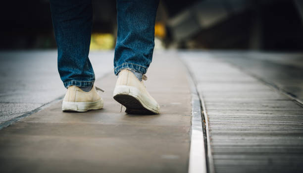 istock Woman jeans and sneaker shoes 646337568