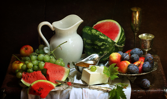 Still life with red wine and watermelon