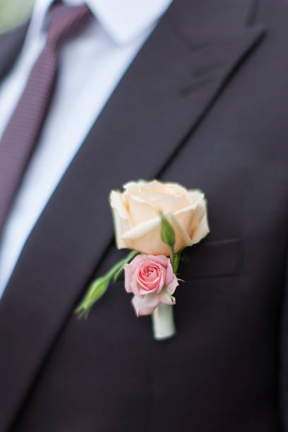 istock Boutonniere on groom's wedding jacket 646345540
