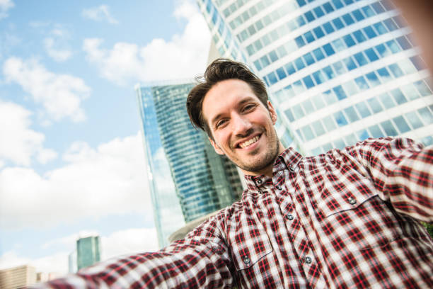 istock casual businessman take a selfie 646347610