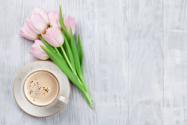 istock Pink tulips and coffee cup 646362836
