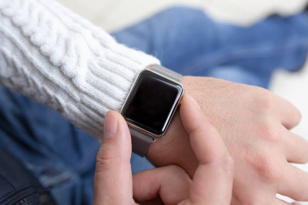 istock man with smart watch on the hand 646363492