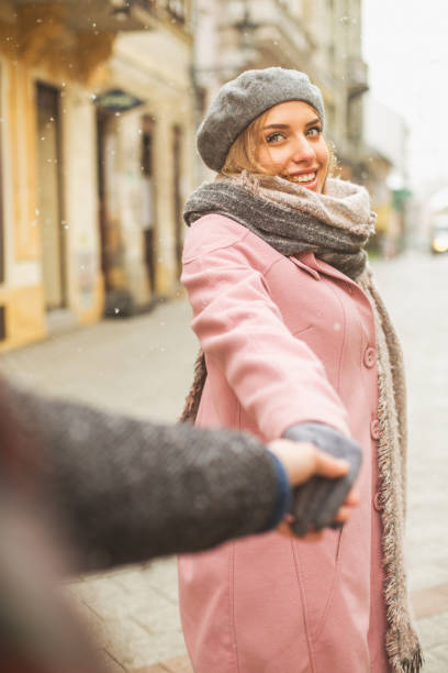 istock Woman holding man's hand 646364056