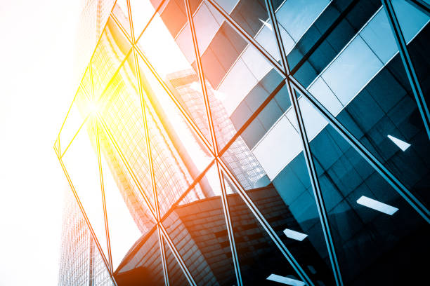 istock Sun ray reflect on modern commercial building 646364162