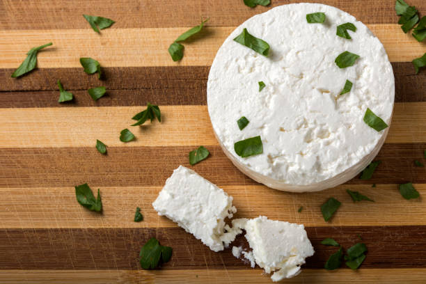 istock Feta cheese on wooden board 646375320