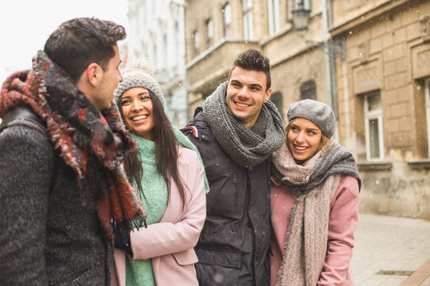 istock Friends walking together on city streets 646385118