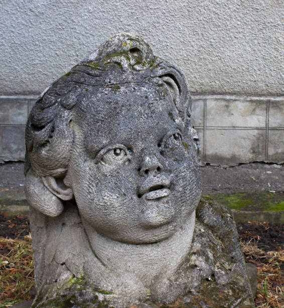 istock Child statue head in the garden 646391150
